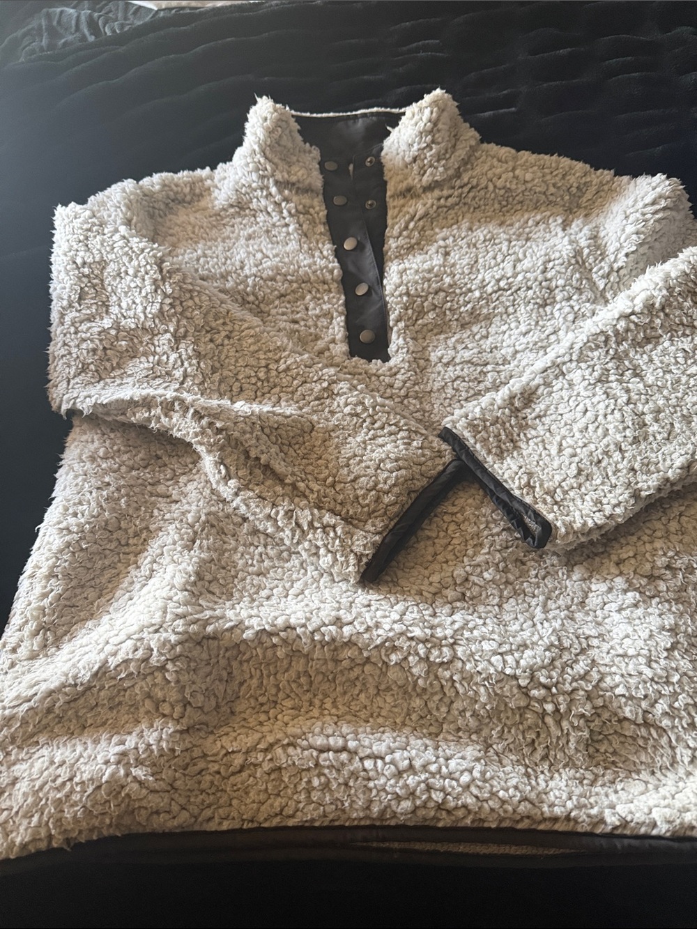 Dylan super cozy pullover with side pockets.   Snap detail